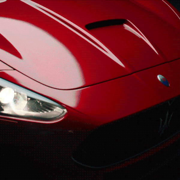 A vertical arc shot video of a red Maserati GranTurismo 2018 car bonnet